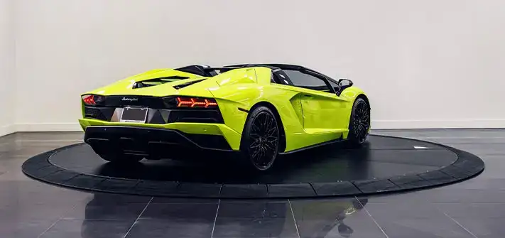 green-lamborghini-aventador-s-roadster-rental-rear-view-orlando-exotic-car-rentals