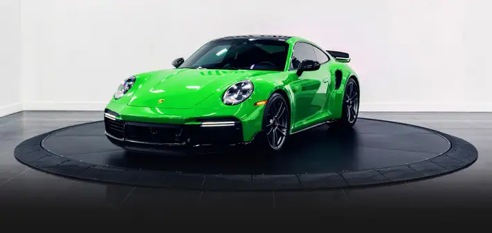 green-porsche-911-turbo-s-rental-profile-view-orlando-exotic-car-rentals