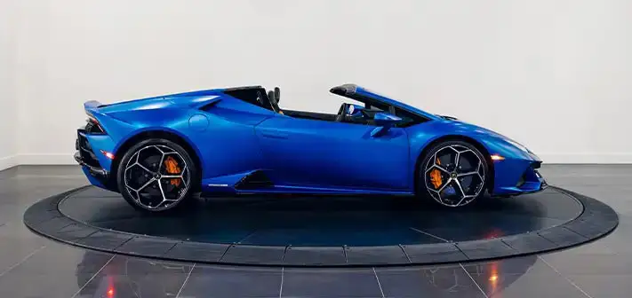 matte-blue-lamborghini-huracan-evo-spyder-rental-side-view-orlando-exotic-car-rentals