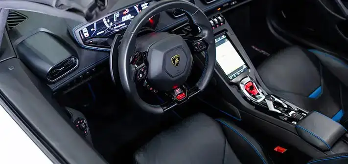 white-lamborghini-huracan-evo-spyder-rental-interior-view-orlando-exotic-car-rentals