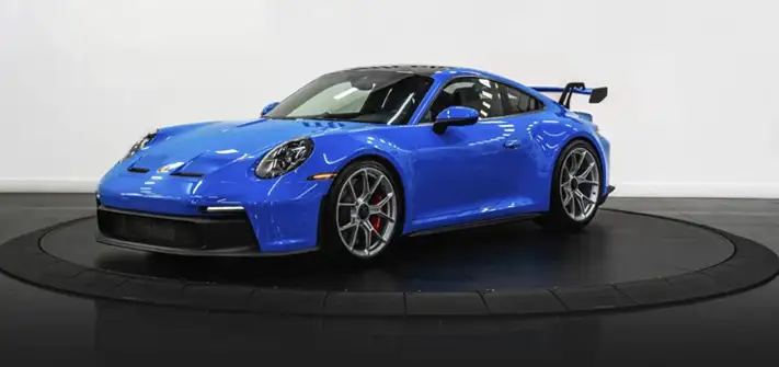 Blue Porsche 911 GT3 rental profile view - Orlando exotic car rental