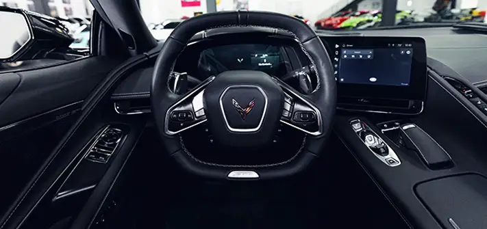 Green Chevrolet Corvette Z06 rental dashboard view - Orlando exotic car rental