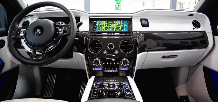 White on blue Rolls Royce Cullinan Black Badge rental dashboard view - Orlando exotic car rental