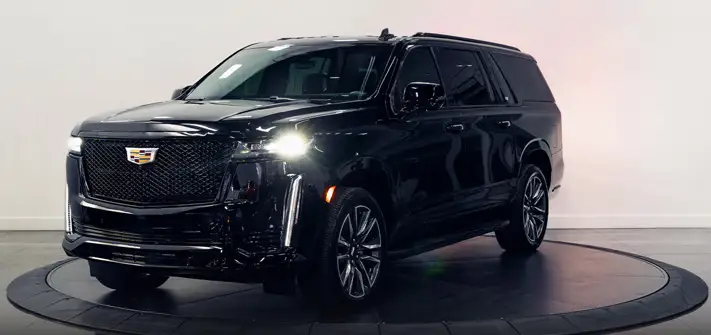 Black on black Cadillac Escalade rental profile view - Orlando exotic car rentals