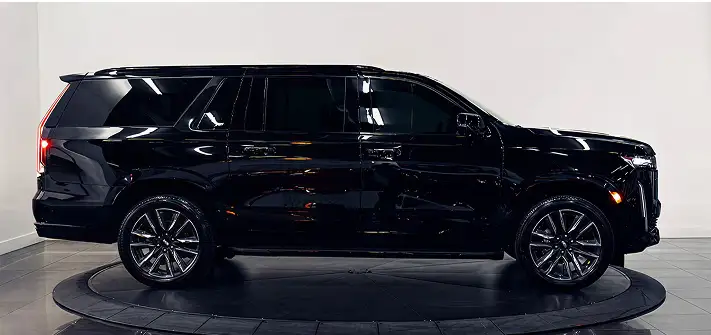 Black on black Cadillac Escalade rental side view - Orlando exotic car rentals