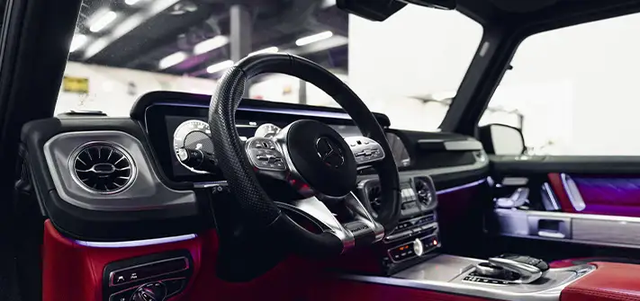 Black with red Mercedes Benz G63 AMG G-Wagon rental interior view - Orlando exotic car rental