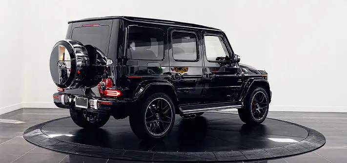 Black with red Mercedes Benz G63 AMG G-Wagon rental rear view - Orlando exotic car rental
