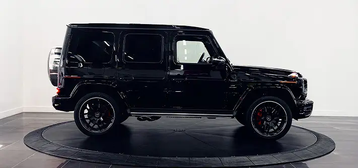 Black with red Mercedes Benz G63 AMG G-Wagon rental side view - Orlando exotic car rental
