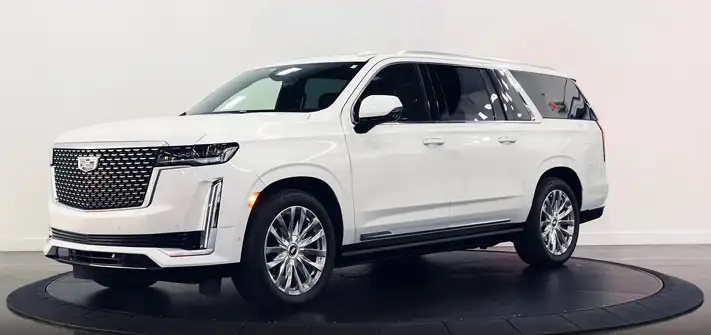 White on black Cadillac Escalade rental profile view - Orlando exotic car rentals