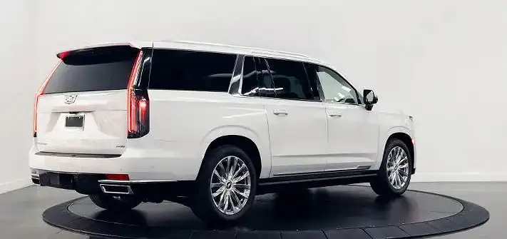 White on black Cadillac Escalade rental rear view - Orlando exotic car rentals