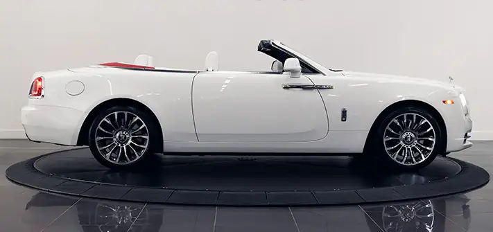 White Rolls Royce Dawn rental side view - Orlando exotic car rentals