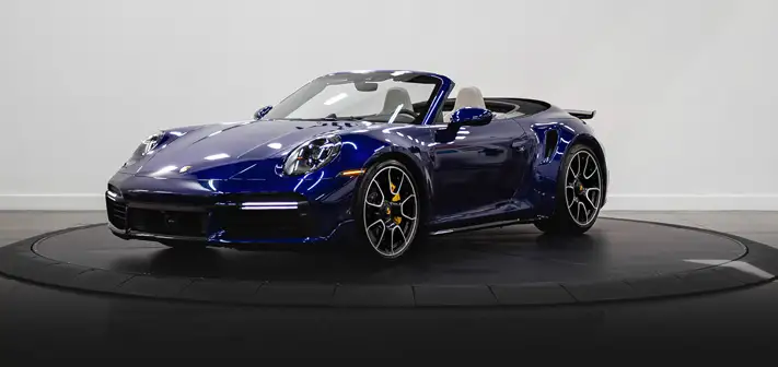 Blue Porsche 911 turbo S rental profile view - Orlando Exotic Car Rentals